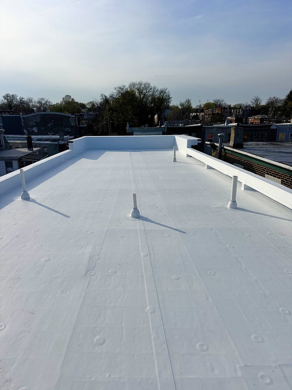 Rivers Edge Development — completed GAF TPO white roof, Edgewater NJ